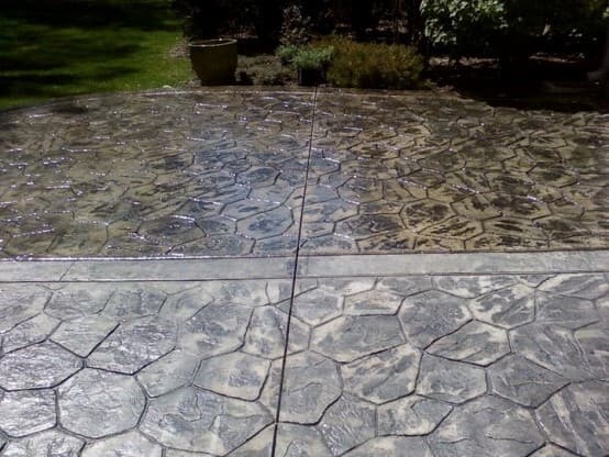 Freshly sealed concrete driveway by TriCity Concrete Sealing in London, Ontario